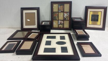 Wood frame collection(36 count) , dark cherry wood frames with assorted sizes and designs. Largest is (24inLx 19inW) Smallest is ( 8.75inLx 6.75inW)