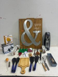 you & Me sign, Soda Stream(unable to test),MYMINI Bundt/lava cake Maker(tested), Vision Vr ( not tested) , (7) Norman Rockwell, coffee mugs, assorted kitchen accessories including, knives, spatulas and much much more.