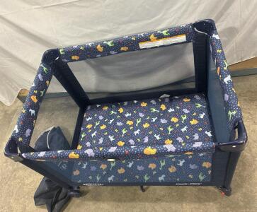 Graco Pack 'n Play portable playard. With carry bag