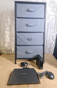 (1) Netgear Nighthawk AC1900 Smart Wi-Fi Router (R7000) W/ AC Adapter, (1) Motorola SURFboard SB6180 DOCSIS 3.0 Cable Modem W/O AC Adapter, (1) USB Mouse & (1) 4-Drawer Fabric Storage Cabinet 16"L x 11"W x 32"T