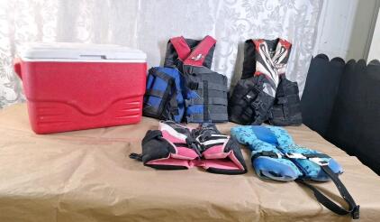 (1) Coleman Cooler & (4) Life Vests