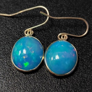 $1655 10K Blue Opal Enhanced(4.9ct) Earrings