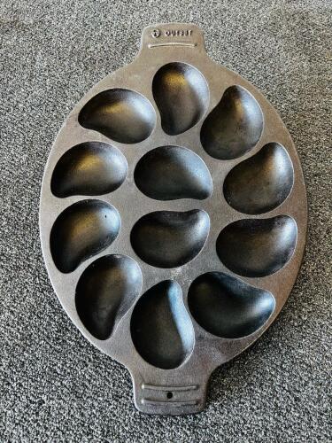 Outset Cast Iron Oyster Grill Pan 12-Well, Pre-Seasoned, Integrated Handles, 19" x 13"