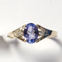 $1400 10K Tanzanite(0.6ct) Diamond(0.02ct) Ring