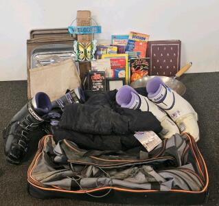 2 Pairs Of Nordic Brand Ski Boots, 3 Pairs Of Snow Pants In Various Sizes, 2 Large Griddle Style Cooking Sheets, Thin Wooden Cutting Board, And More