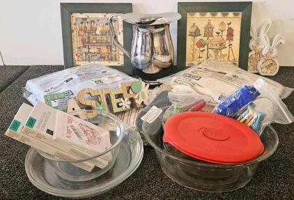 Pyrex dishes, stainless steel pitcher, new women's cardigans, children's water shoes, home decor and more.