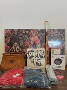 Wicker Basket Labeled 'Makimoo&rsquo;, Wall Decor, 2 Shirts, Baseball Bat, Thermal Pet Bowl, And More