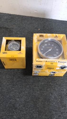 (1) Auto Meter Carbon Fiber Fuel Guage (1) Auto Meter 5” Tachometer