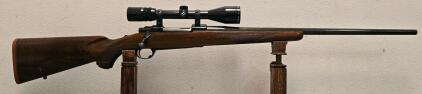 Ruger M77 7MM Rem Mag Bolt-Action Rifle, Walnut Stock, 24" Barrel, Bushnell 4-12x Scope