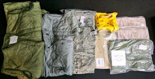 (#3) Mixed Military & Fire Lot: Tan Uniform Shirt, Long Sleeve, Poly-Cotton Blend, Chest Pockets, Button Front, New in Packaging. Firefighter pants, Sleeping Bag Liners (British), Four Pairs of Medium-Short Military Pants, Six Cold Weather Coat Liners