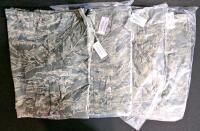 (#3) Mixed Military & Fire Lot: Tan Uniform Shirt, Long Sleeve, Poly-Cotton Blend, Chest Pockets, Button Front, New in Packaging. Firefighter pants, Sleeping Bag Liners (British), Four Pairs of Medium-Short Military Pants, Six Cold Weather Coat Liners - 10