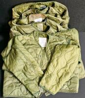 (#3) Mixed Military & Fire Lot: Tan Uniform Shirt, Long Sleeve, Poly-Cotton Blend, Chest Pockets, Button Front, New in Packaging. Firefighter pants, Sleeping Bag Liners (British), Four Pairs of Medium-Short Military Pants, Six Cold Weather Coat Liners - 13