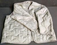 (#3) Mixed Military & Fire Lot: Tan Uniform Shirt, Long Sleeve, Poly-Cotton Blend, Chest Pockets, Button Front, New in Packaging. Firefighter pants, Sleeping Bag Liners (British), Four Pairs of Medium-Short Military Pants, Six Cold Weather Coat Liners - 15