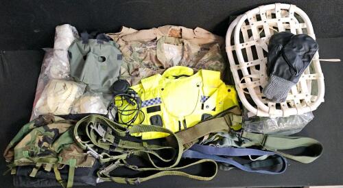 (#3) Mixed Military Lot: Two Bivy Covers, Toxicologal Apron (Small), Swedish Snow Shoes, British Police Vest, U.S. Army "Decker" Jacket, Tan Trench Coat, Insulated Vest, Two Cold Weather Full Face Masks, Two Helmet Covers, and More!