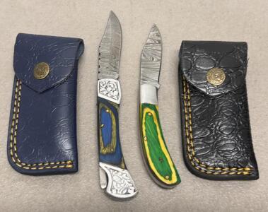 (2) Custom Damascus Folding Pocket Knives with Decorative Handles and Leather Sheaths