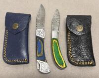 (2) Custom Damascus Folding Pocket Knives with Decorative Handles and Leather Sheaths