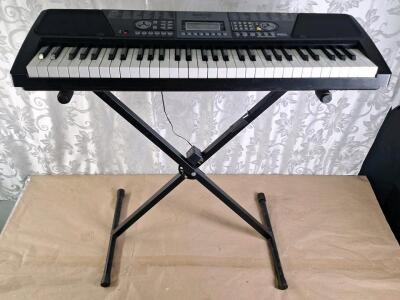 (1) Electronic Keyboard W/ AC Adapter & Stand