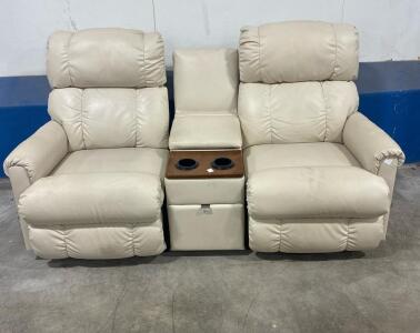 Beige Manual Reclining Loveseat with Console, Cup Holders, and Storage Drawer. L60inx30InDx39inH