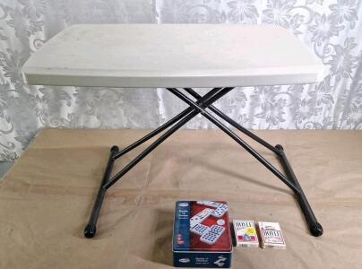 (1) Lifetime Personal Folding Table, Indoor/Outdoor, 30"L x 19.4"W, (4) Adjustable Heights, (1) Tin Of Dominos & (2) Decks Of Playing Cards