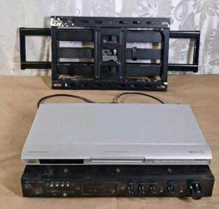 (1) JVC KV-N332 DVD / CD Player, (1) Technical Pro IA25U Integrated Amplifier & (1) TV Wall Mount