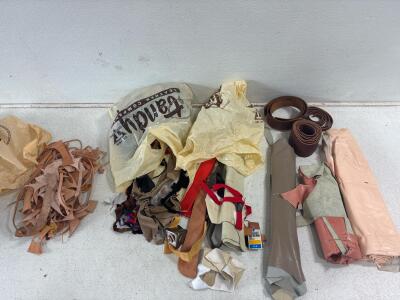 Leather working material, different scraps from projects 3 rolls of leathe, many miscellaneous scraps of many colors.