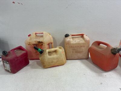 (2) 2 gallon gas cans, 2.5 gallon can, (2) 5 gallon gas cans