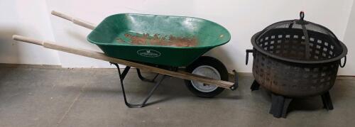 Round Steel Outdoor Fire Pit with Mesh Lid, Handles, and Lattice Airflow Design & Landscapers Wheelbarrow