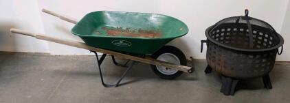 Round Steel Outdoor Fire Pit with Mesh Lid, Handles, and Lattice Airflow Design & Landscapers Wheelbarrow
