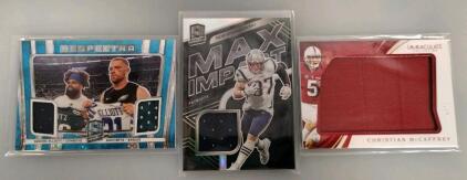 2018 Spectra Respectra Elliott/Ertz Dual Patch, 2018 Spectra Max Impact Gronkowski Patch, 2017 Immaculate McCaffrey Patch /49