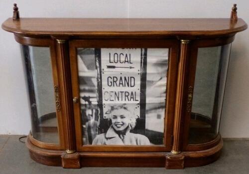 Antique Curved Glass Display Cabinet With Mirrored Back and Brass Accents