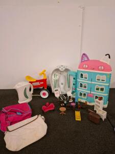 Large mixed lot , pocket doppler, doll house, foot spa, water heater, little Tikes toddle scooter and more