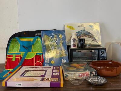 REI Duffle Bag, Hamilton Beach Toaster, 3 &times; 1000-pc Puzzles, Scrapbook Kit, Kitchenware Lot