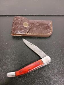 Folding Pocket Knife: Patterned Blade, Red Wood Handle, Embossed Leather Sheath Included