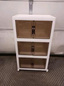 Plastic Storage Cabinet With 3 Compartments, Swing Doors, And Casters