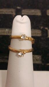 Pair Of Yellow Gold Tone Solitaire Rings With Round Cubic Zirconia