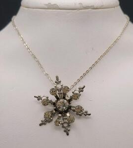 Silver-Tone Snowflake Pendant Necklace with Clear stones.