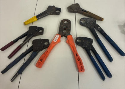PEX Crimping tools used in plumbing.