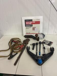 Ball Tow Hitch, Jumper cables, Large Monkey wrench,outer tie rod end,front sway bar link,inner tie rod end,fuel injector return line,front upper control arm and ball joint assembly,