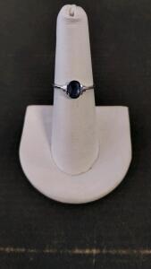 1.00Ct Oval Blue Sapphire Solitaire Ring, Size N/US 6.75, 1.7G Silver Half-Bezel Setting, Serial K12E2