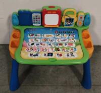 VTech Touch & Learn Activity Desk Deluxe, sunflower Cookie jar, and large lot of frames/framed artwork - 5