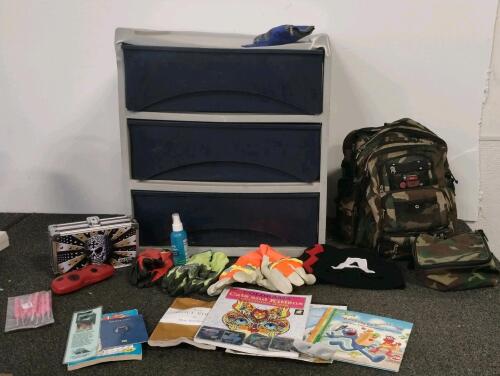 Coleman QuickBed Queen Size Flocked Air Mattress, Canyon County Sheriff&rsquo;s Office Challenge Coin, camo backpack, school supplies, plastic three drawer organizer, and more.