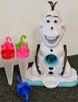 (XB) Mixed Collectible and Kitchen Lot: Legend of Zelda Shield Backpack, 3 Assorted Tupperwares, Plastic Pitcher, 3 Assorted Travel Coffee Mugs, Olaf Snowcone Maker, Popsicle Mold, Cheese Grater and Cheese Knife, Two Paring Knives, Baby Gate, 8 Sets of Co - 7