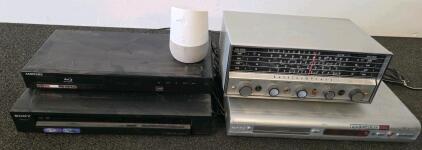 Hallicrafters Radio S-120, Samsung BD-P1590, Sony RDR-GX255, Philips DVD, Google Home. (XB)
