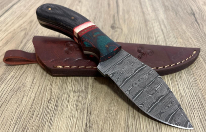 Custom Damascus Steel Fixed Blade Knife with Patterned Handle and Tooled Leather Sheath