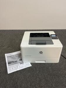 HP LaserJet Pro M402n Monochrome Laser Printer, 40ppm, Network & USB, SN: PHBHXH7962, turns on