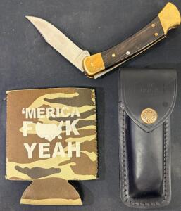 Buck 110 Folding Hunter Knife, 3.75" Blade, Ebony Handle, Brass, Leather Sheath, Used