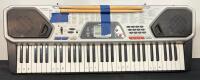 HP 2311x 23" Monitor, Meccano G15 Robot, RadioShack MD-982 61-Key Keyboard - 3