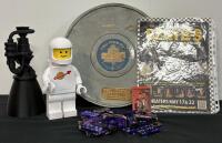 Beatles "Lost Concert" Poster, LEGO Spaceman, Bell 16mm Film, Rocket Model, Resin Domino Set Lot