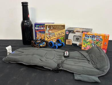 Mixed Lot: Conair Massage Pad, NFL Raiders Toaster, 2 RC Cars, Bottle Bank, Board Games, Puzzle