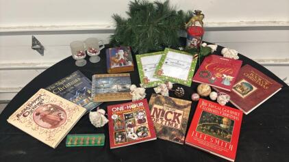 Assortment Of Christmas Books And Vintage Holiday Decorations